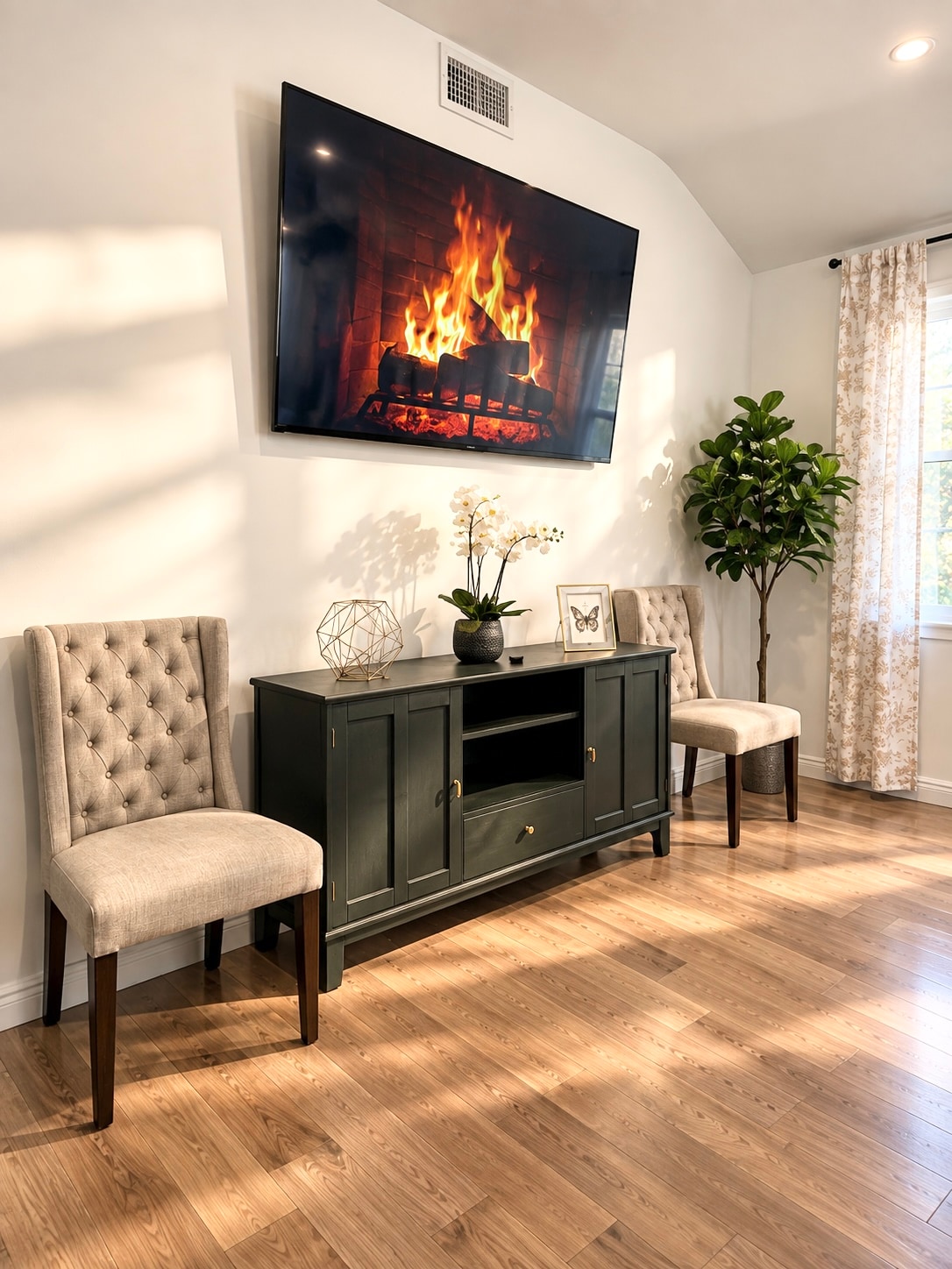 Luxury Spanish Villa - HV1 lounge with electric fireplace and two accent chairs